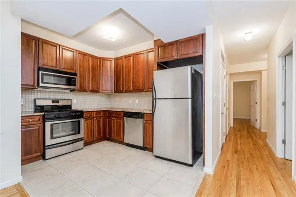 $989,000 | 8409 19th Avenue, Unit 1C | Van Pelt Manor