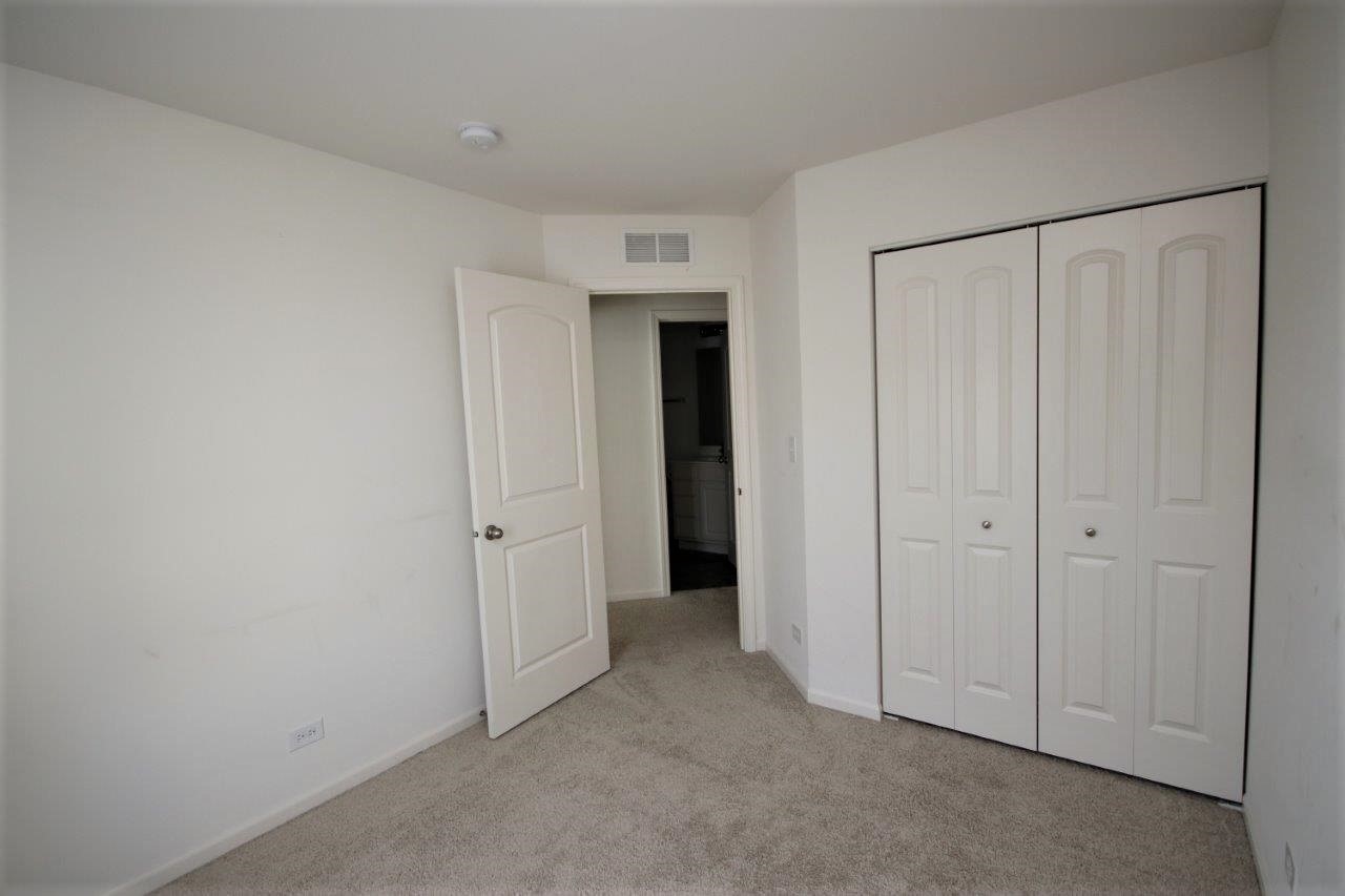 1785 Ruby Drive Pingree Grove, IL 60140 - Photo 14 of 24 a view of a livingroom with an empty space