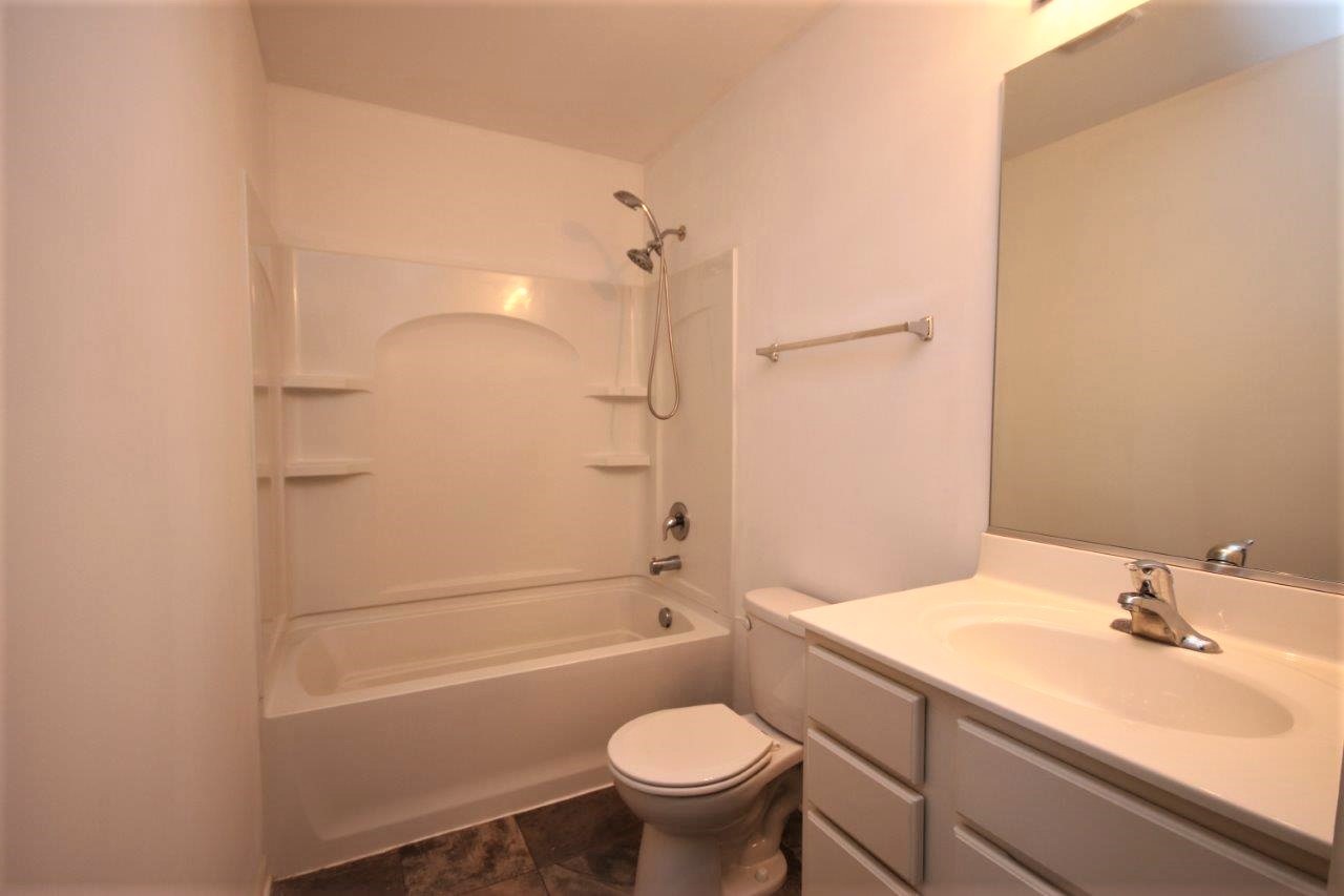1785 Ruby Drive Pingree Grove, IL 60140 - Photo 15 of 24 a bathroom with a sink toilet vanity and shower
