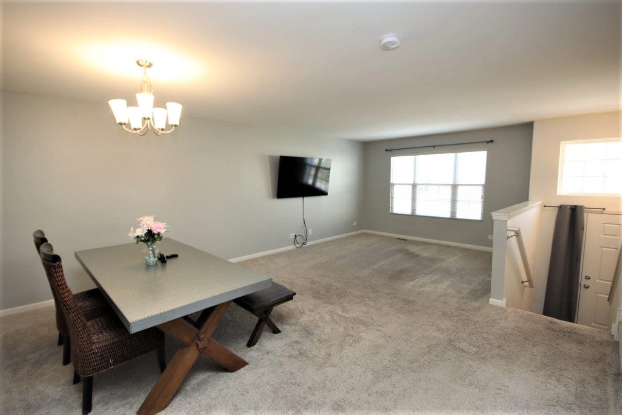 1785 Ruby Drive Pingree Grove, IL 60140 - Photo 2 of 24 a view of a workspace with furniture
