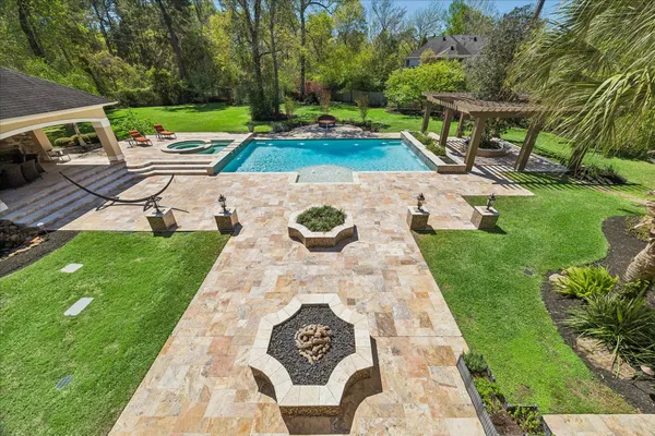 a view of yard with patio