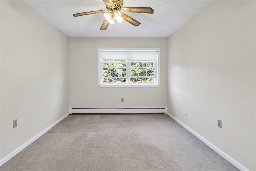 35 Fernview Avenue, Unit 5 North Andover, MA 01845 - Photo 13 of 32 an empty room with a window