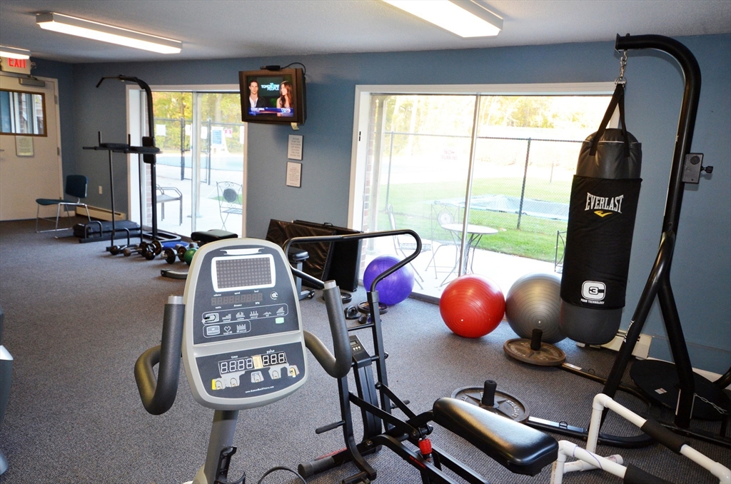 35 Fernview Avenue, Unit 5 North Andover, MA 01845 - Photo 30 of 32 a room with gym equipment