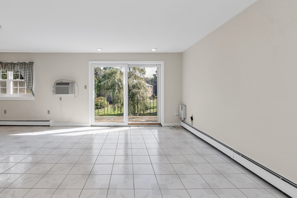 35 Fernview Avenue, Unit 5 North Andover, MA 01845 - Photo 7 of 32 a view of an empty room with a window