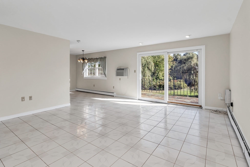 35 Fernview Avenue, Unit 5 North Andover, MA 01845 - Photo 8 of 32 a view of an empty room with a window