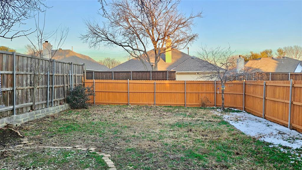 7640 Tournament Road Frisco, TX 75035 - Photo 21 of 25 a view of a backyard
