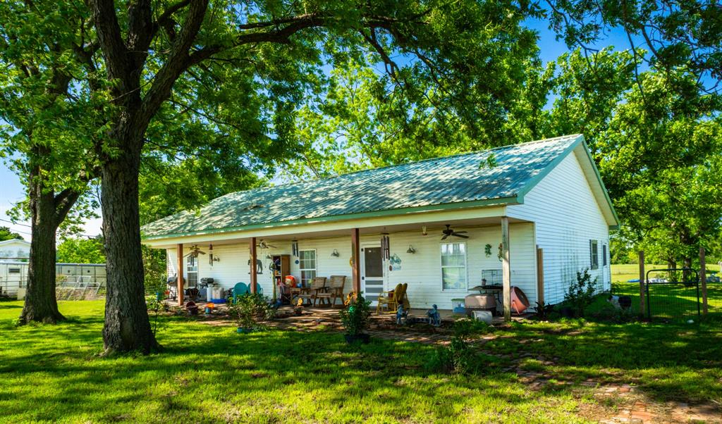 682 Lcr 450 Groesbeck, TX 76642 - Photo 2 of 38 a view of a house with garden and yard