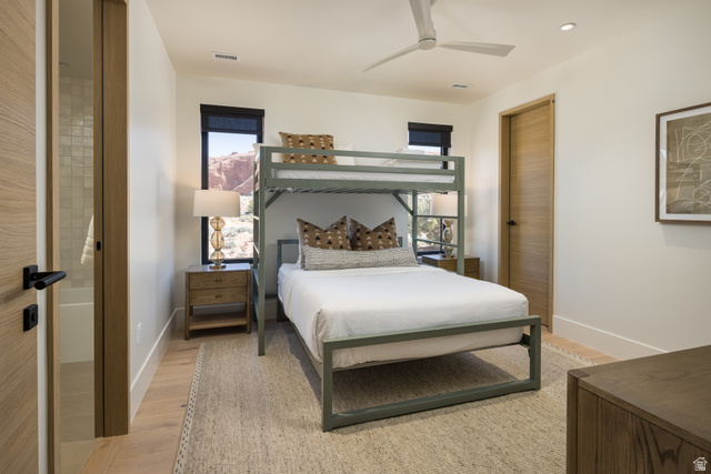 214 Lionsback Loop, Unit 37 Moab, UT 84532 - Photo 15 of 21 Light wood-finish flooring, a contemporary ceiling fan, and recessed lighting