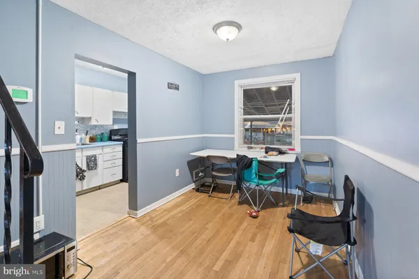 a workspace with furniture and a window