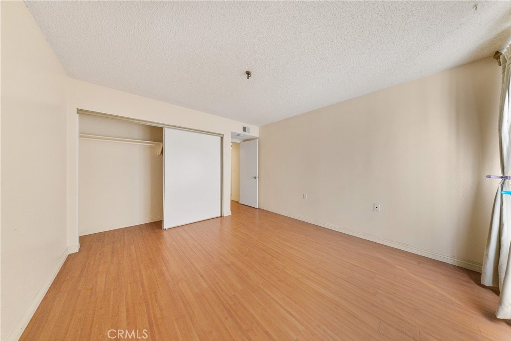 4501 Peck Road, Unit 76 El Monte, CA 91732 - Photo 23 of 35 a view of an empty room with wooden floor