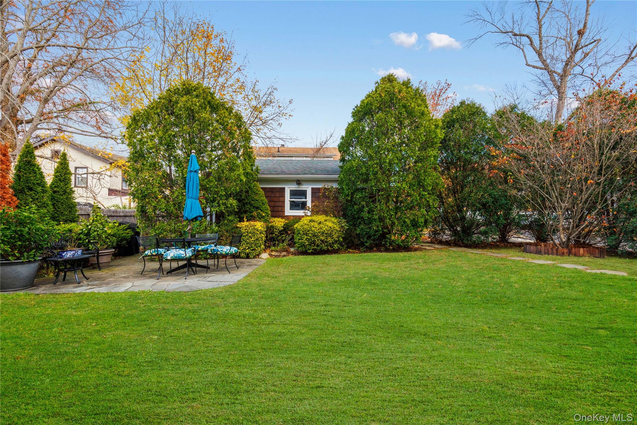 2 Goldwin Street, Unit 1 Rye, NY 10580 - Photo 12 of 18 a view of a house with backyard porch and sitting area