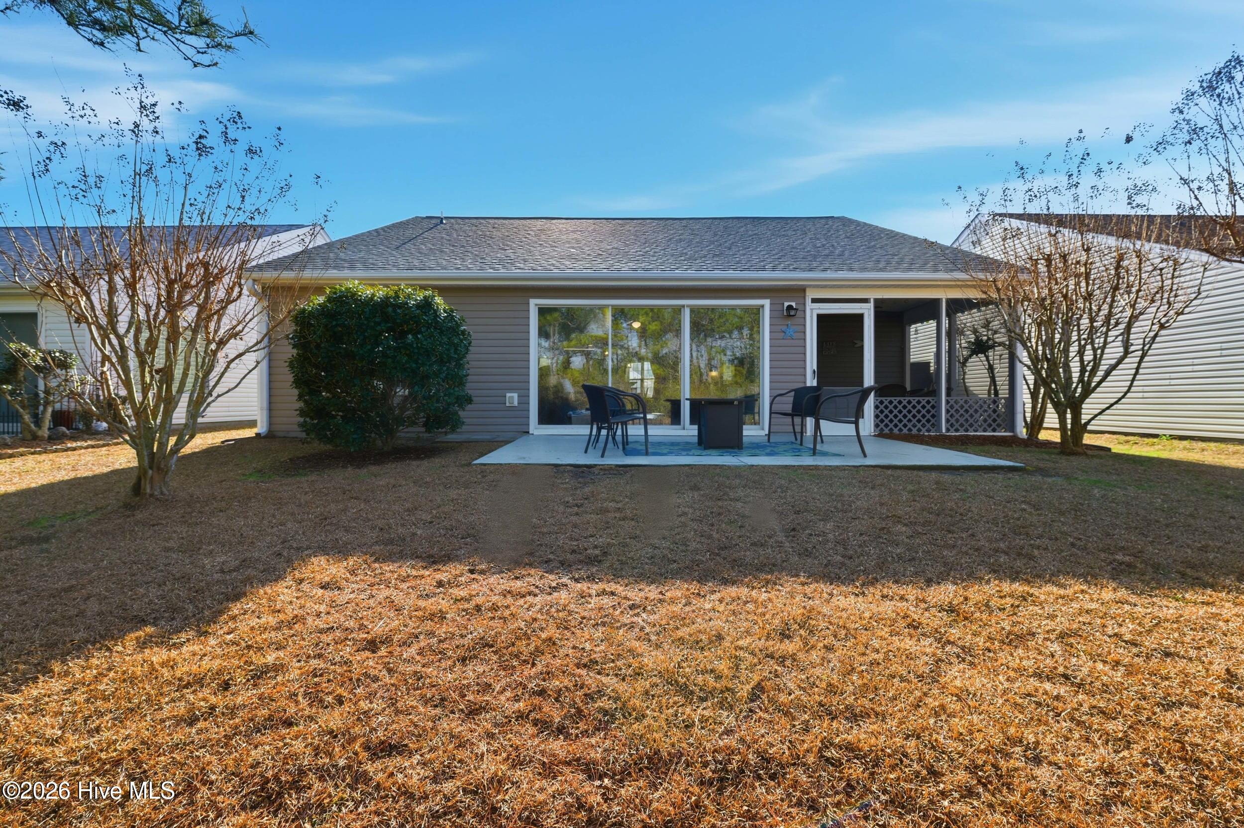 952 Wyndfall Drive Southwest Sunset Beach, NC 28468 - Photo 30 of 43 Rear home view