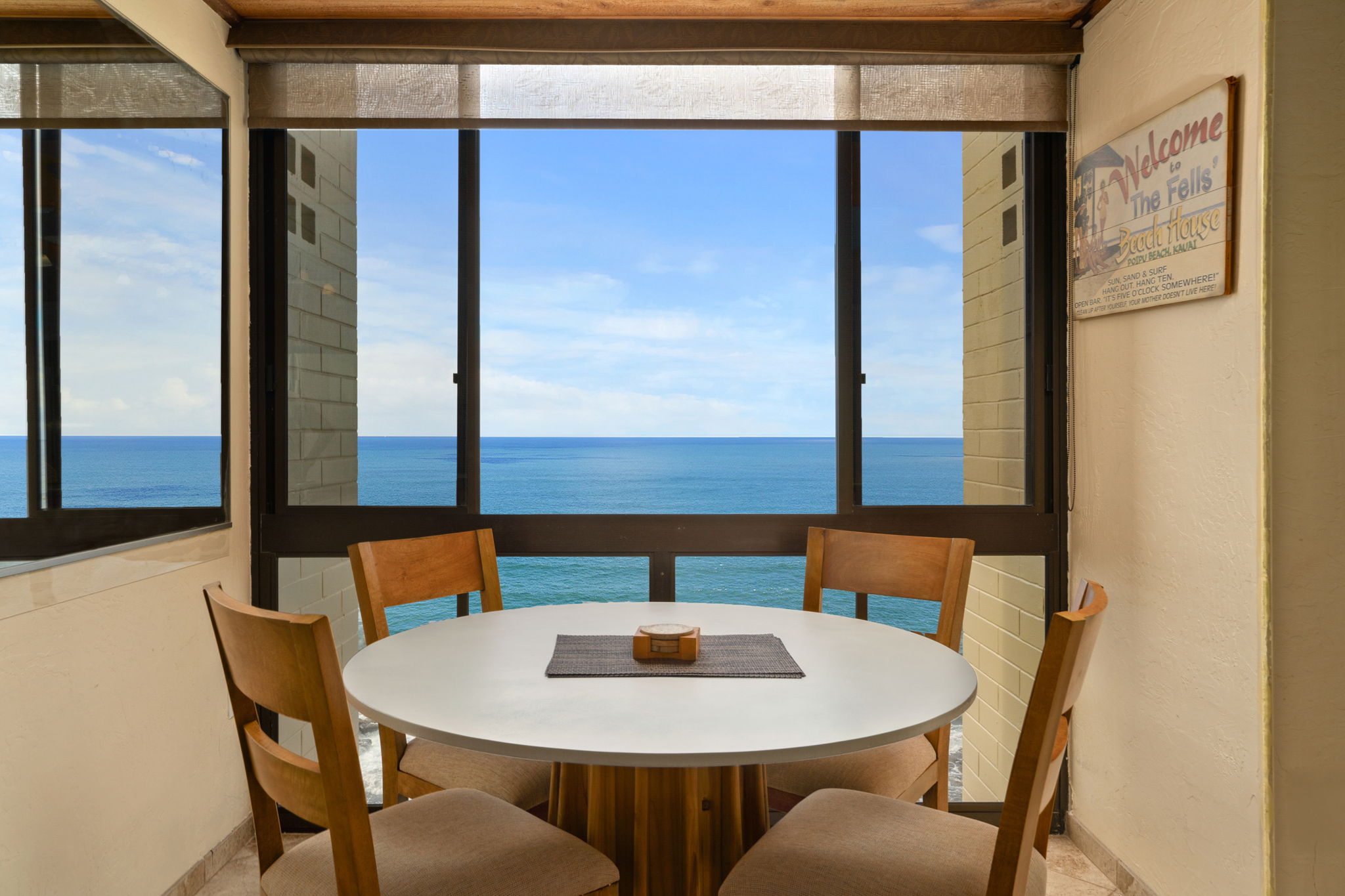 5050 Lawai Road, Unit 311 Koloa, HI 96756 - Photo 2 of 21 a view of a dining room with furniture and window