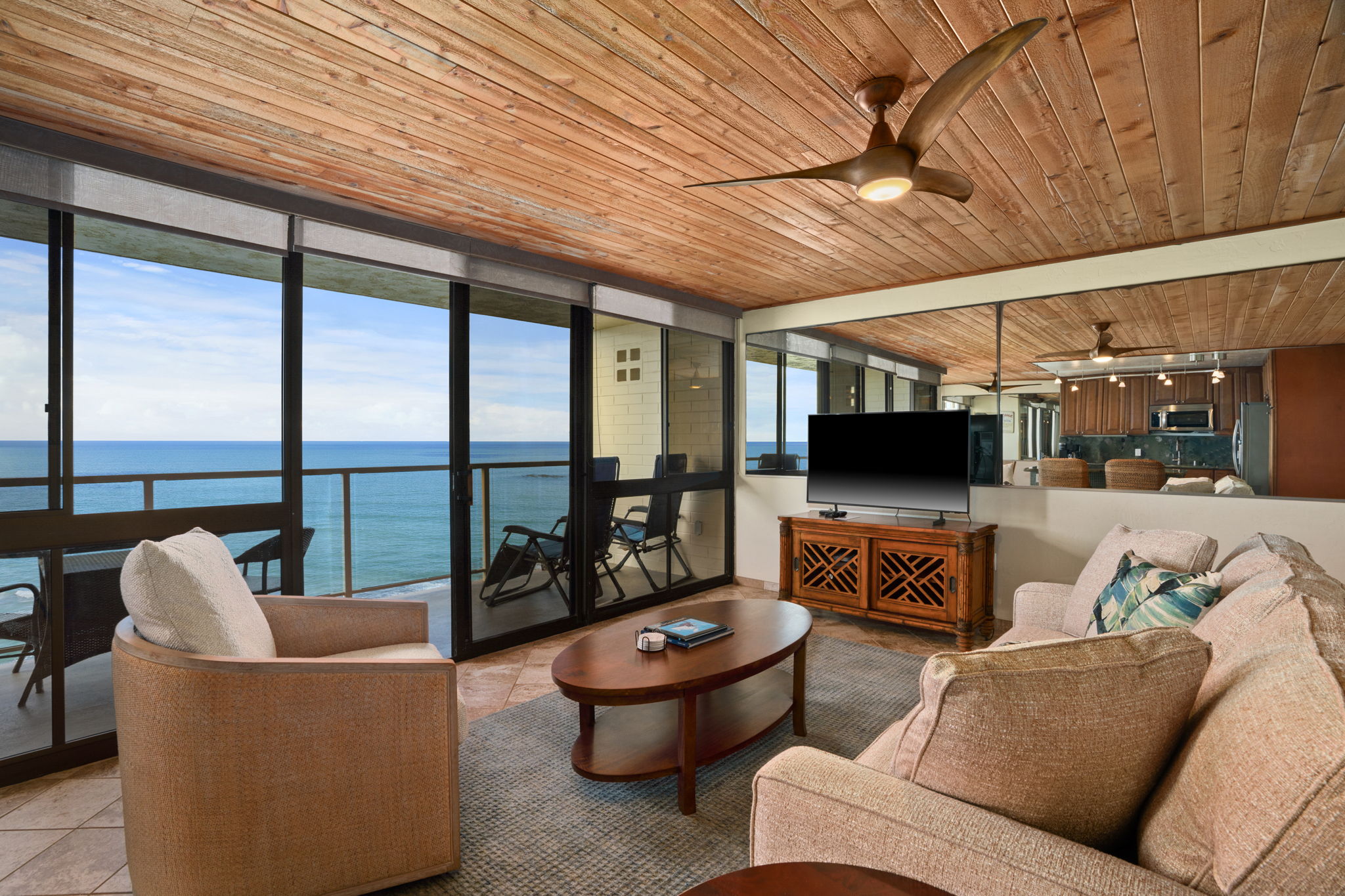 5050 Lawai Road, Unit 311 Koloa, HI 96756 - Photo 7 of 21 a living room with furniture and a flat screen tv