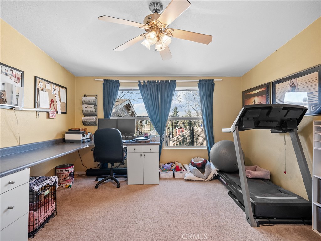 2826 Marco Road Phelan, CA 92371 - Photo 22 of 33 a bedroom with bed and a window