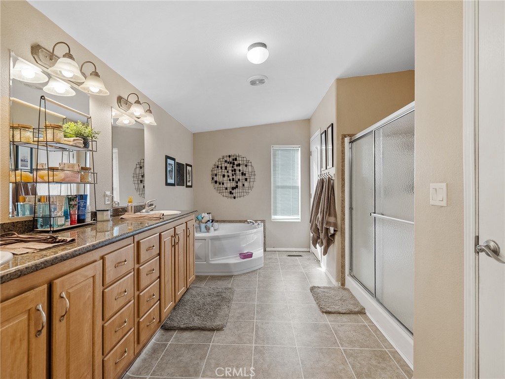 2826 Marco Road Phelan, CA 92371 - Photo 24 of 33 a large white kitchen with a large window