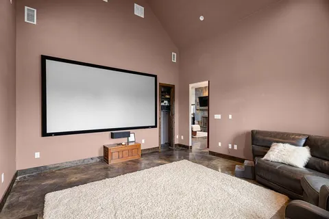 a bedroom with a bed and couch