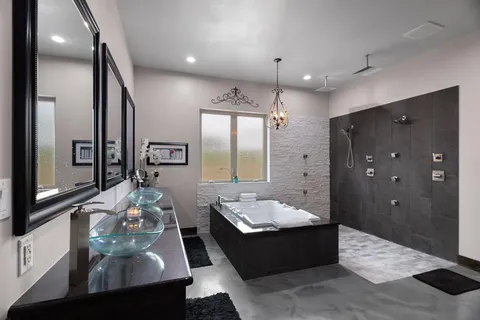 a living room with furniture and a large mirror