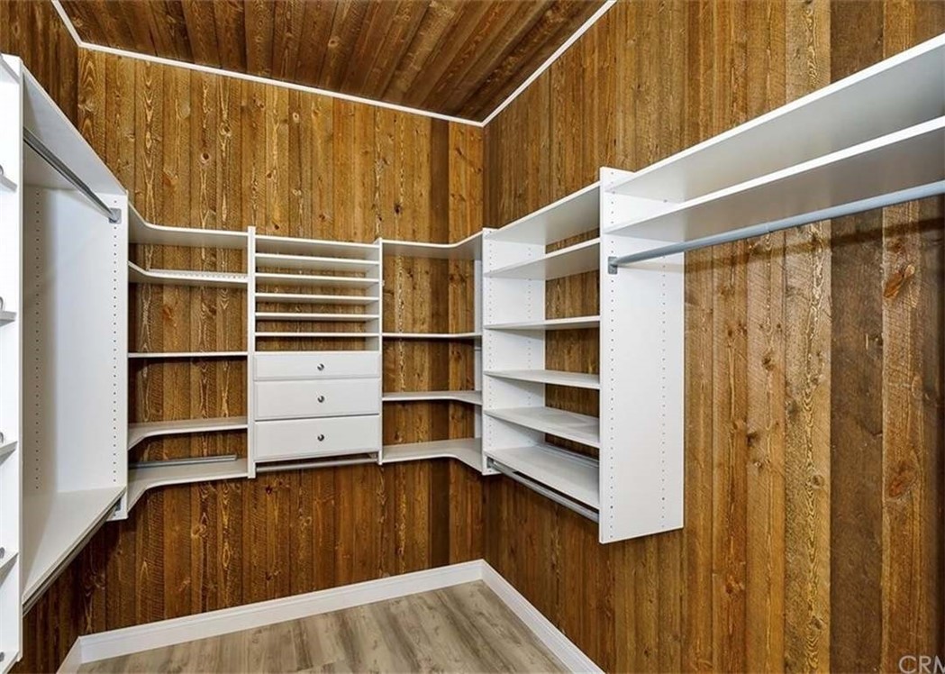 32700 Cox Road Menifee, CA 92584 - Photo 29 of 65 a view of walk in closet with empty racks