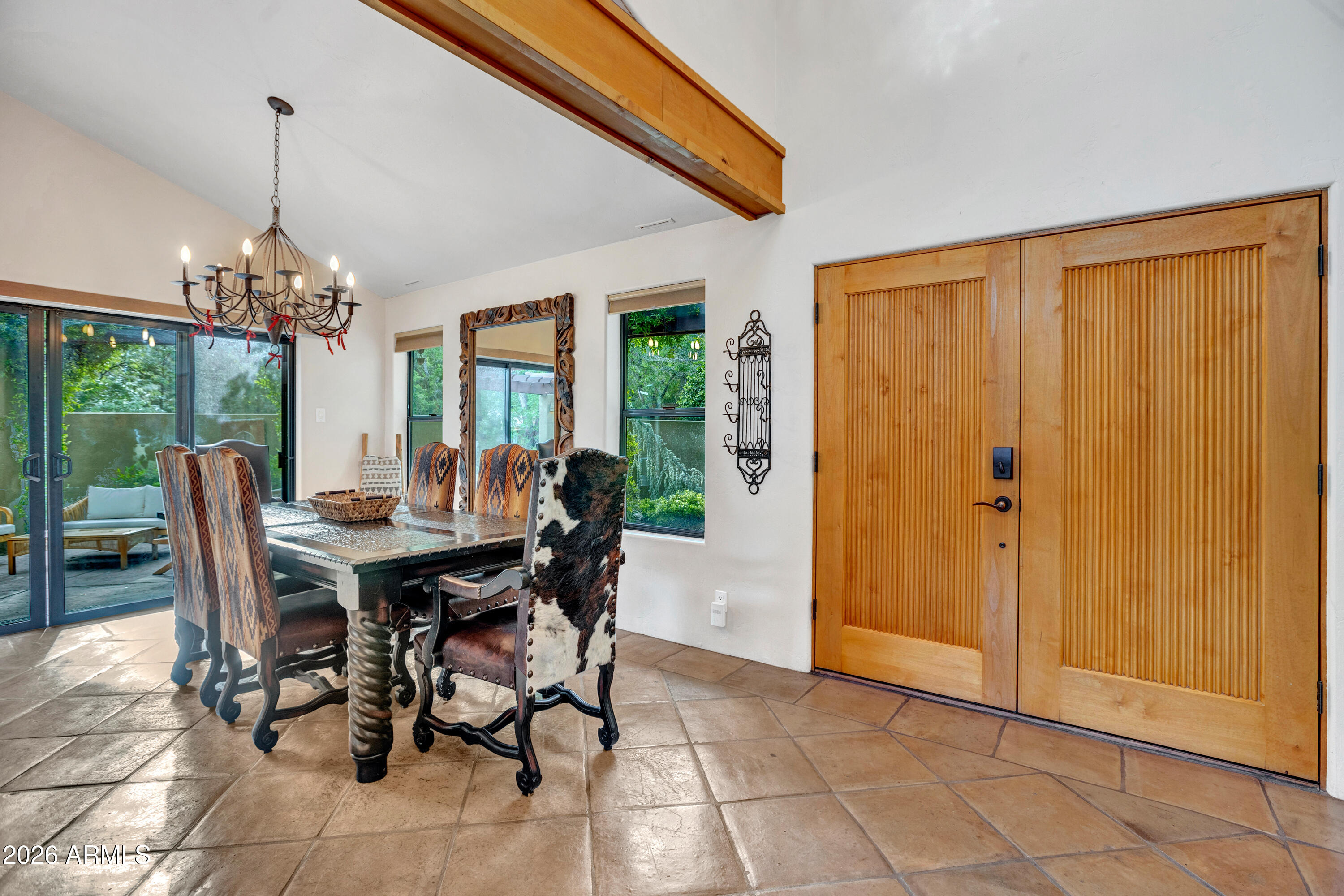 55 Ranch House Circle Sedona, AZ 86336 - Photo 11 of 61 a view of a dining room with furniture and chandelier