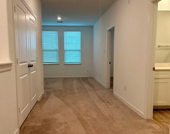 a bathroom with a toilet a sink and bathtub