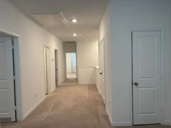 a view of house with backyard and outdoor seating