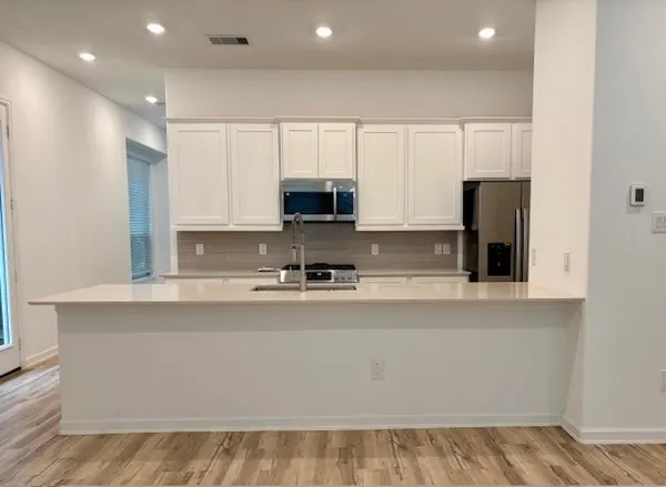 a view of a room that has a sink