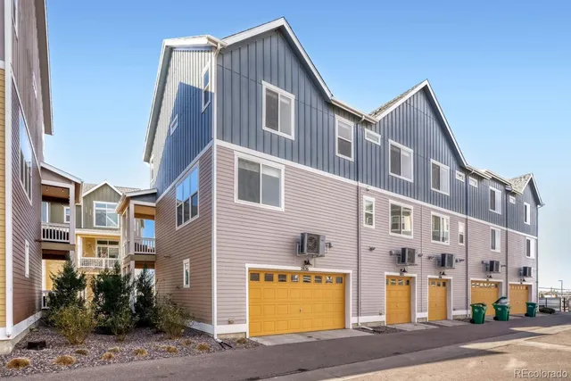 a front view of a building with a street