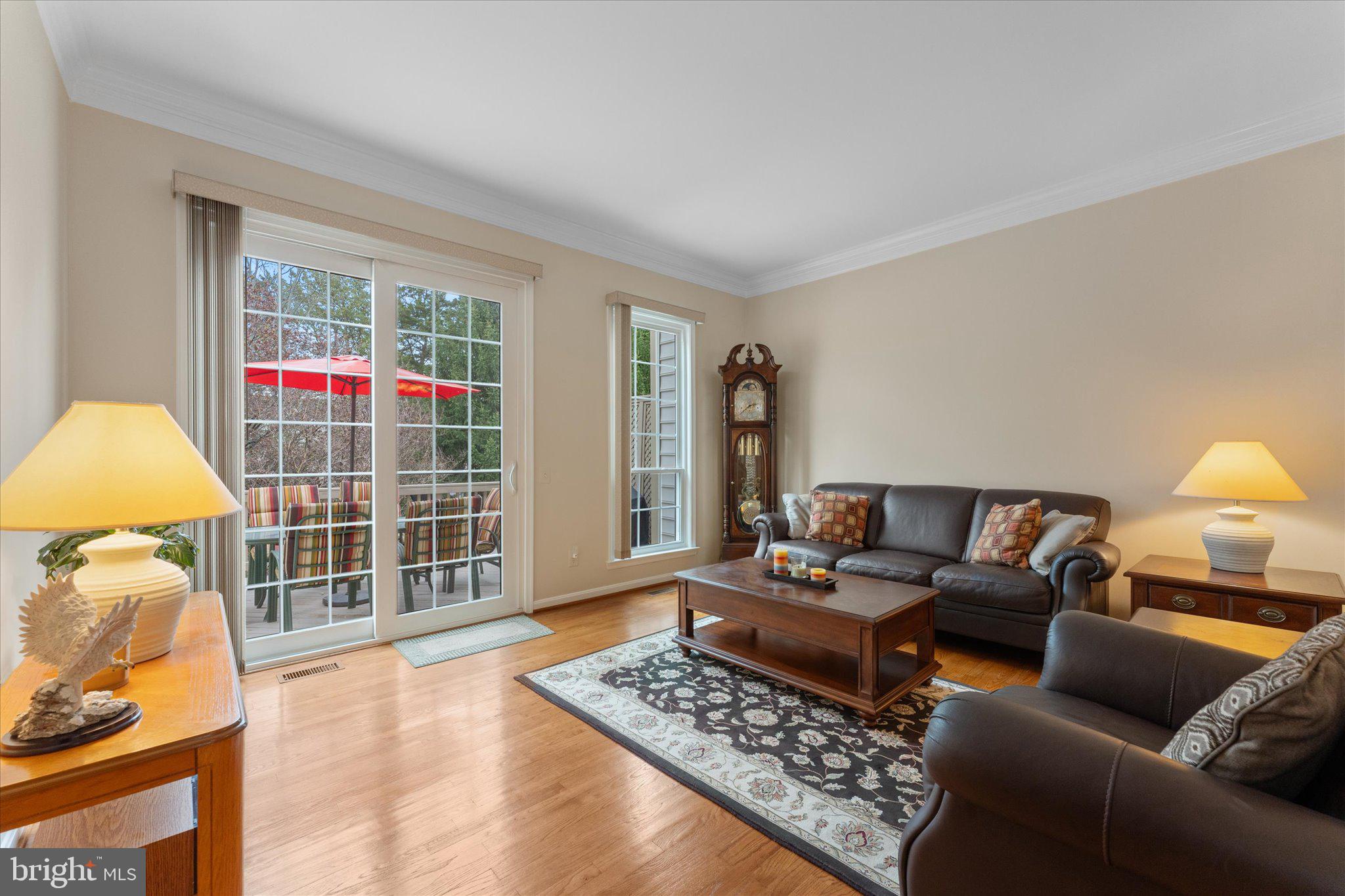 20900 Trinity Square Sterling, VA 20165 - Photo 2 of 46 a living room with furniture and a window