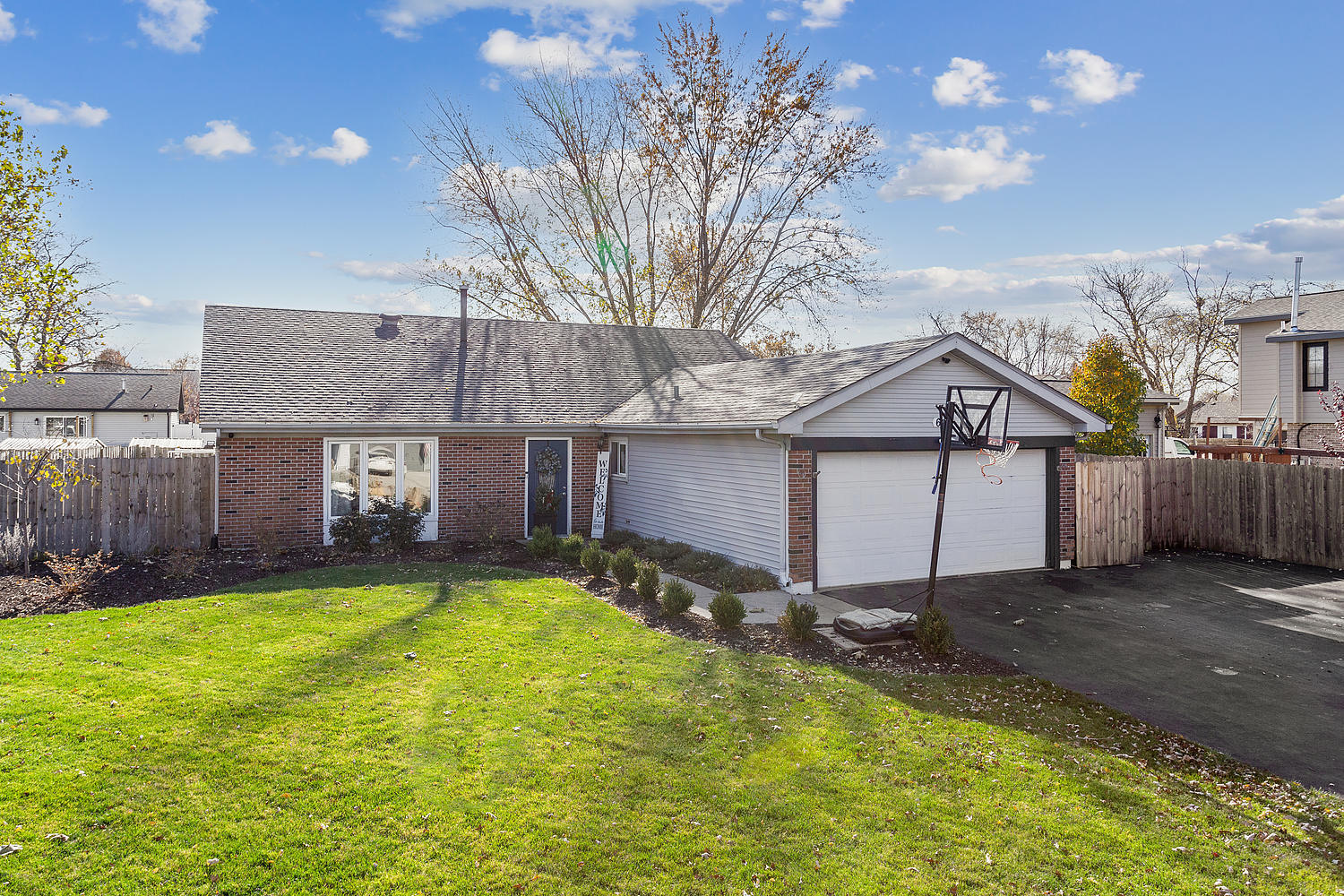 647 Rockhurst Road Bolingbrook, IL 60440 - Photo 1 of 14 a view of a house with a yard garage and outdoor seating