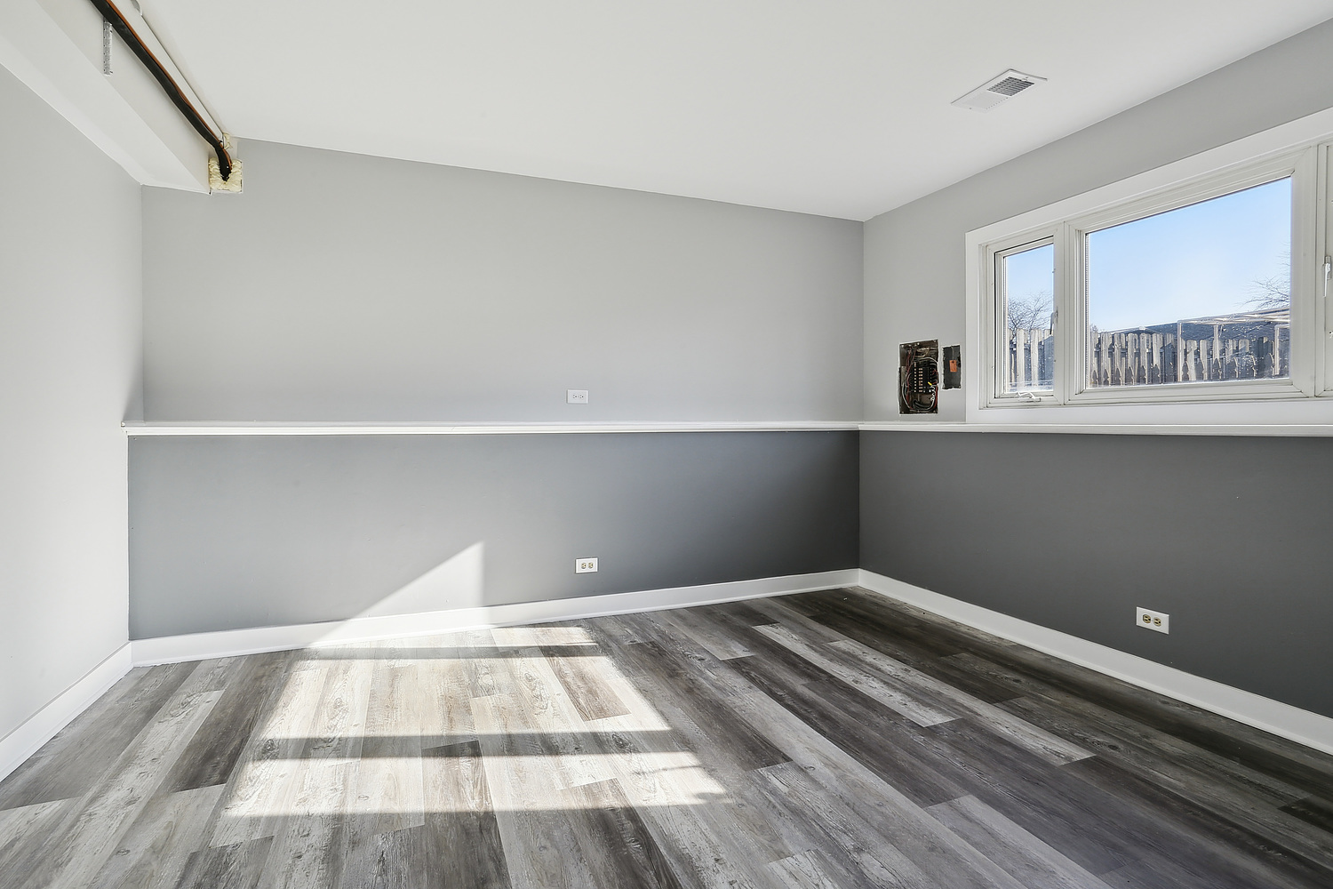 647 Rockhurst Road Bolingbrook, IL 60440 - Photo 12 of 14 a view of a room with wooden floor and cabinets