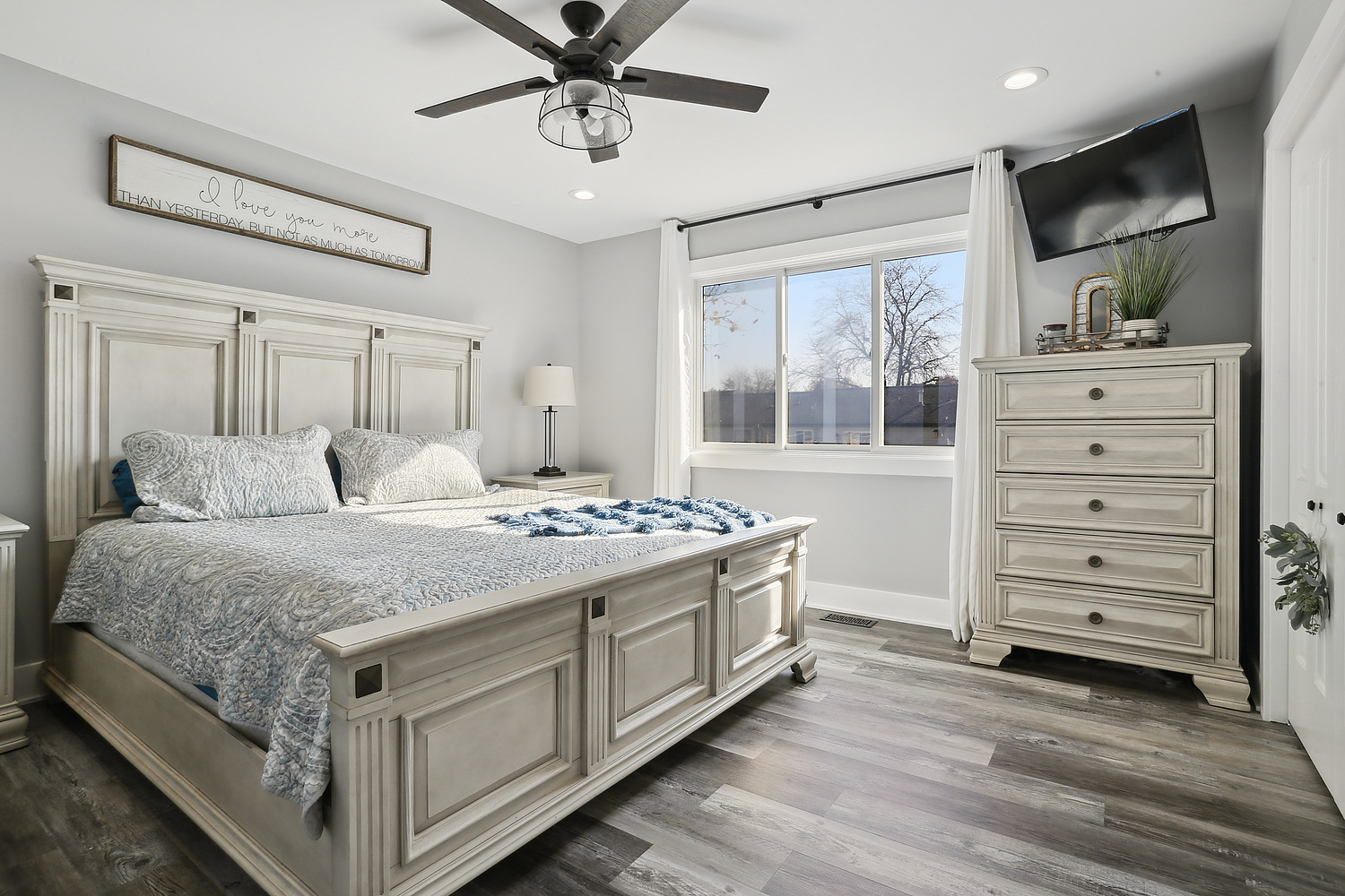 647 Rockhurst Road Bolingbrook, IL 60440 - Photo 6 of 14 a spacious bedroom with a bed and a dresser