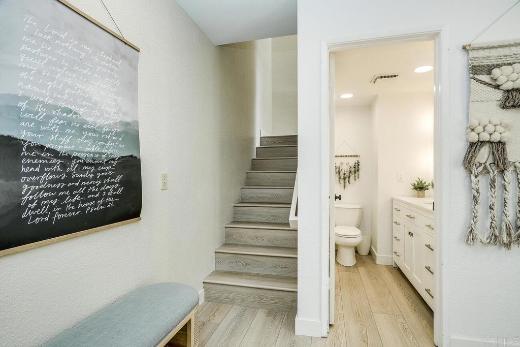 7585 Eads Avenue, Unit C La Jolla, CA 92037 - Photo 15 of 29 a view of entryway with wooden floor and stairs
