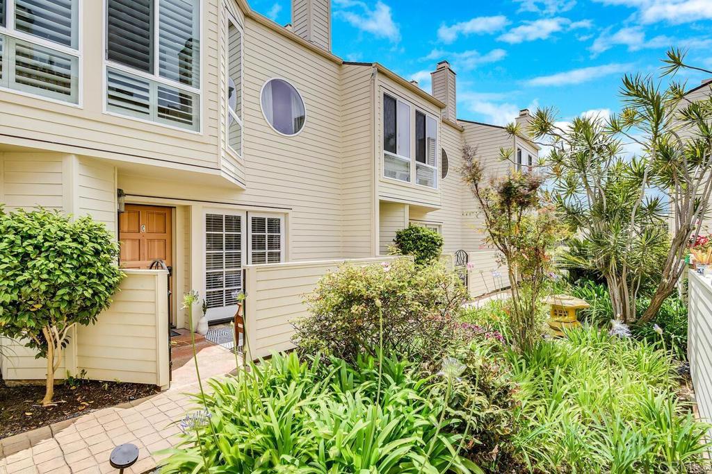 7585 Eads Avenue, Unit C La Jolla, CA 92037 - Photo 24 of 29 a view of a house with a yard and garden