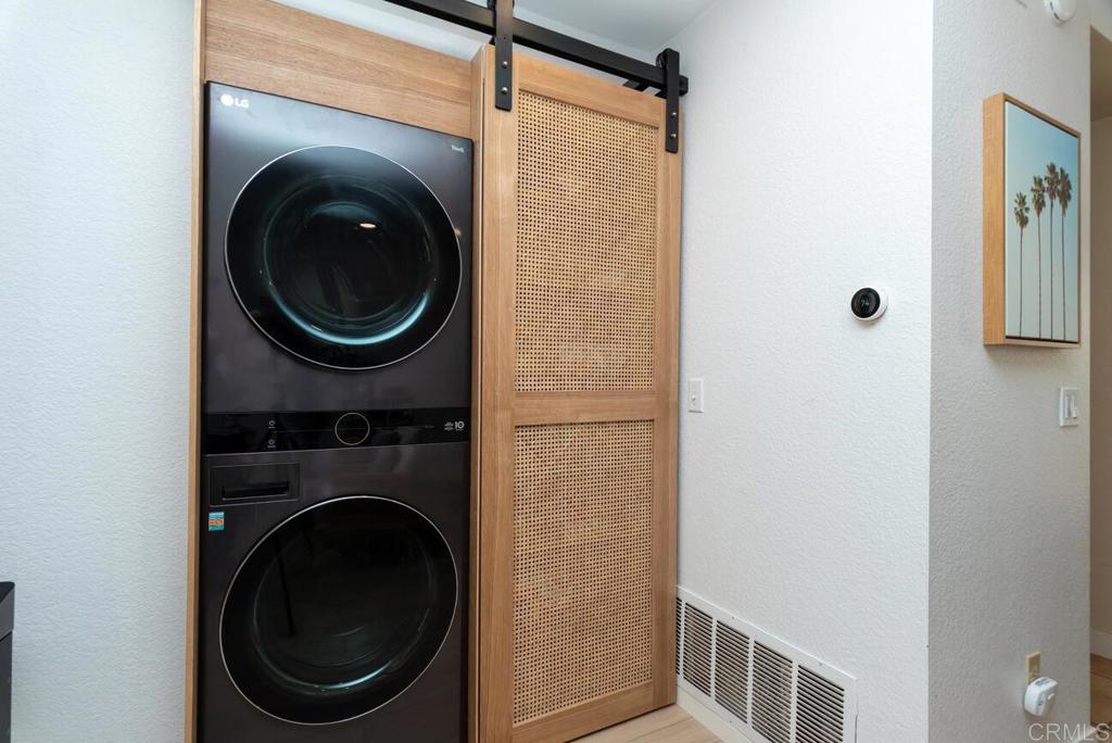 7585 Eads Avenue, Unit C La Jolla, CA 92037 - Photo 6 of 29 a close up view of a washer and dryer