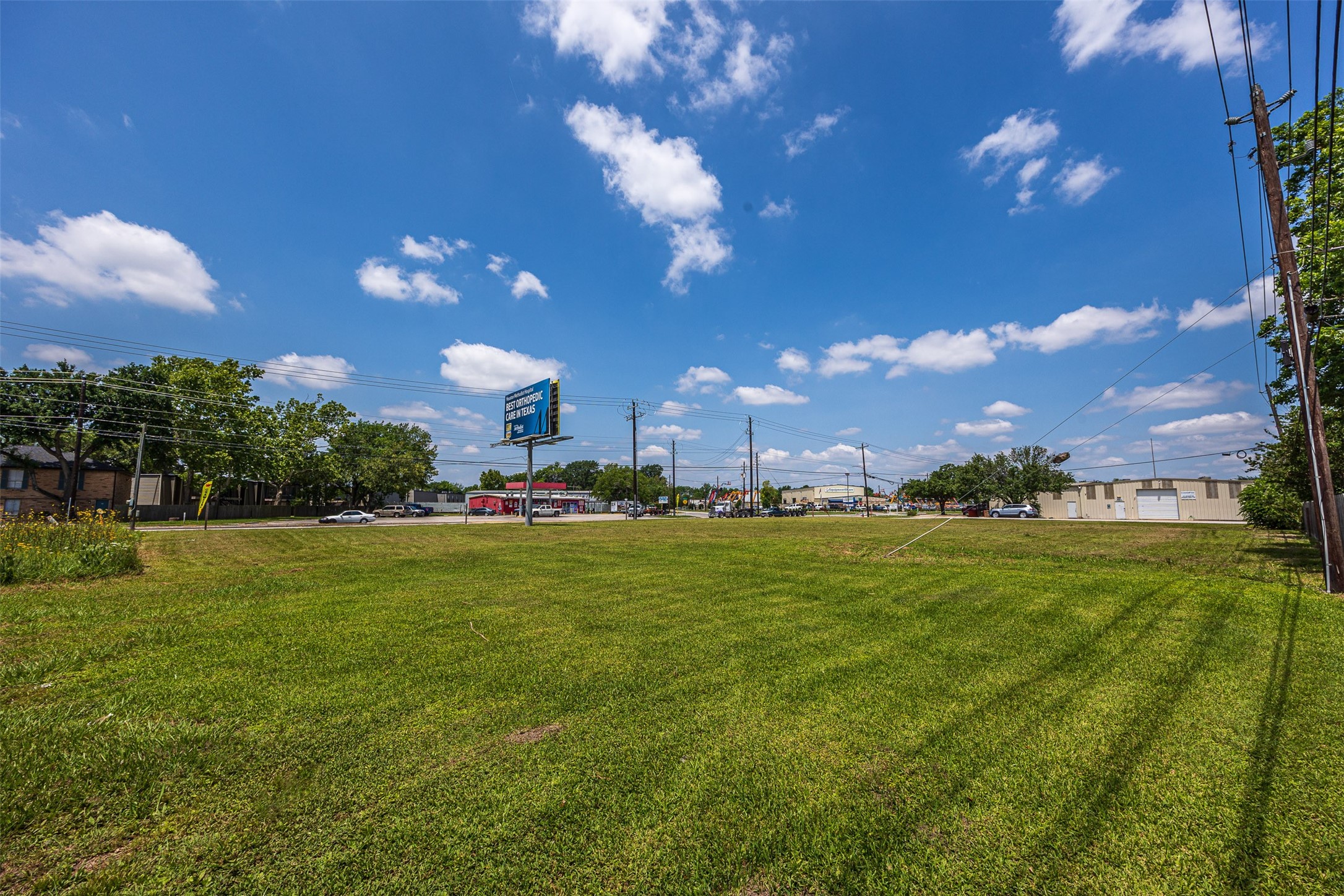 5905-5909 Red Bluff Road Pasadena, TX 77505 - Photo 6 of 10 a view of a golf course with a lake