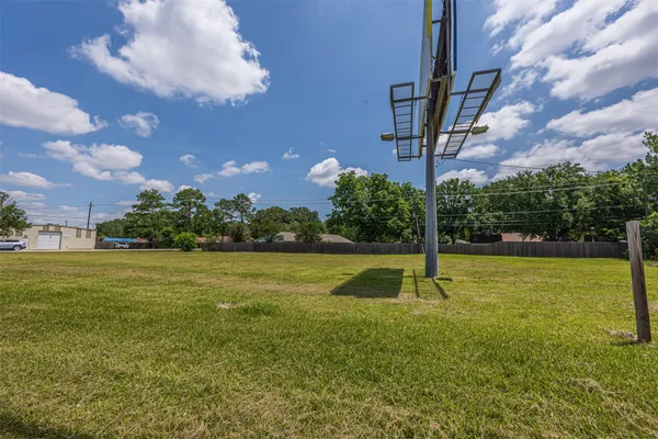 a view of a golf course with a lake