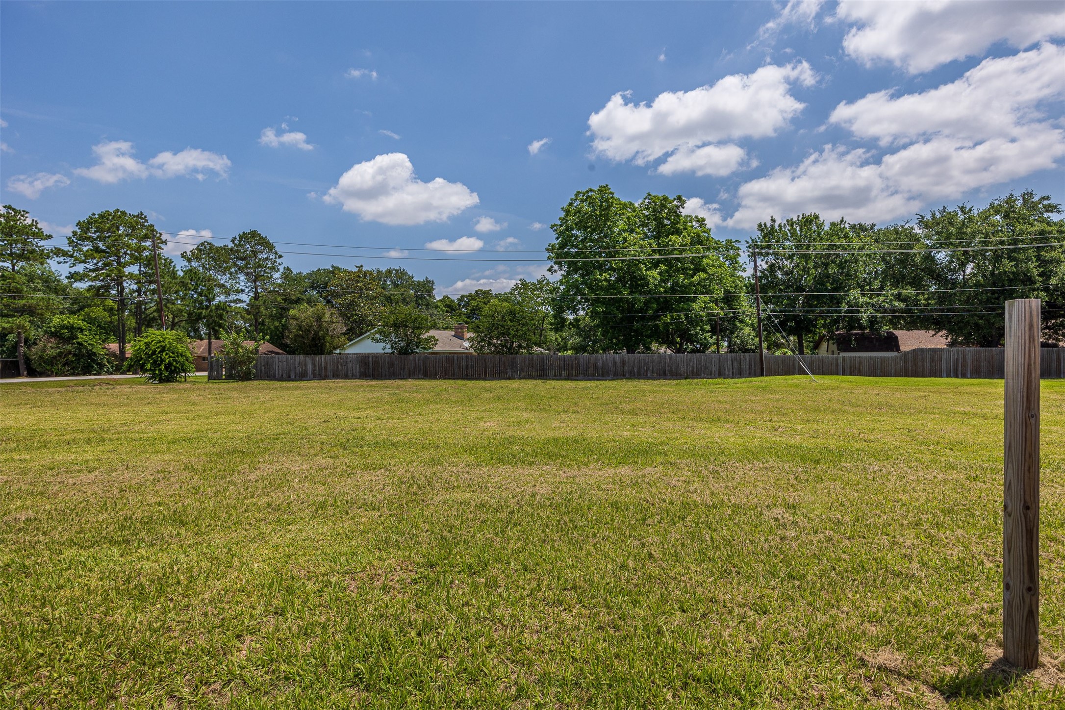 5905-5909 Red Bluff Road Pasadena, TX 77505 - Photo 10 of 10 a view of a golf course with a lake