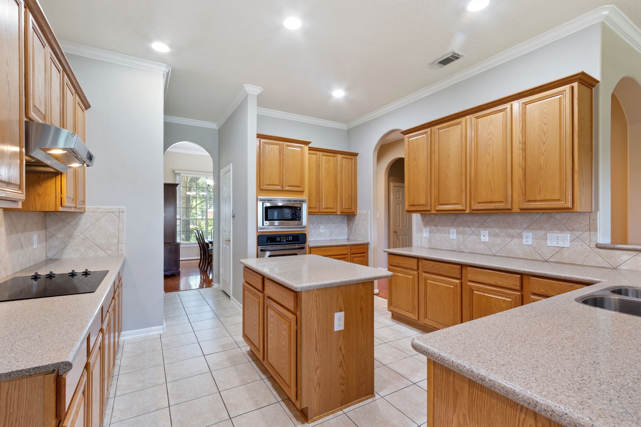 6311 Stone Trail Lane Spring, TX 77379 - Photo 16 of 47 Easy service to the formal dining room