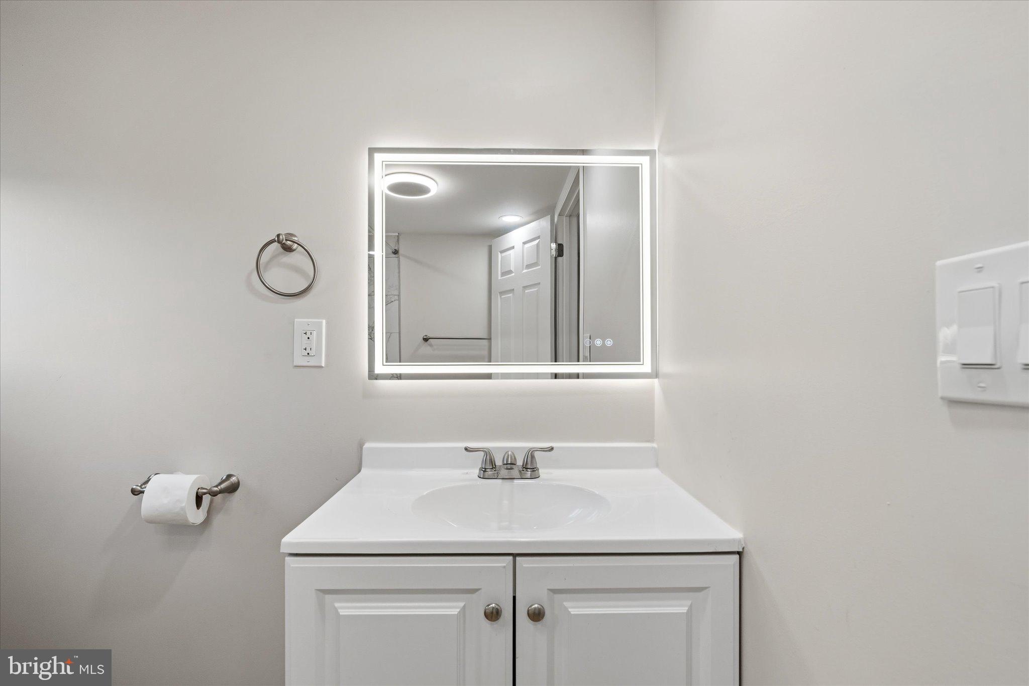 831 Deturksville Road Pine Grove, PA 17963 - Photo 7 of 24 a bathroom with a sink vanity and a mirror