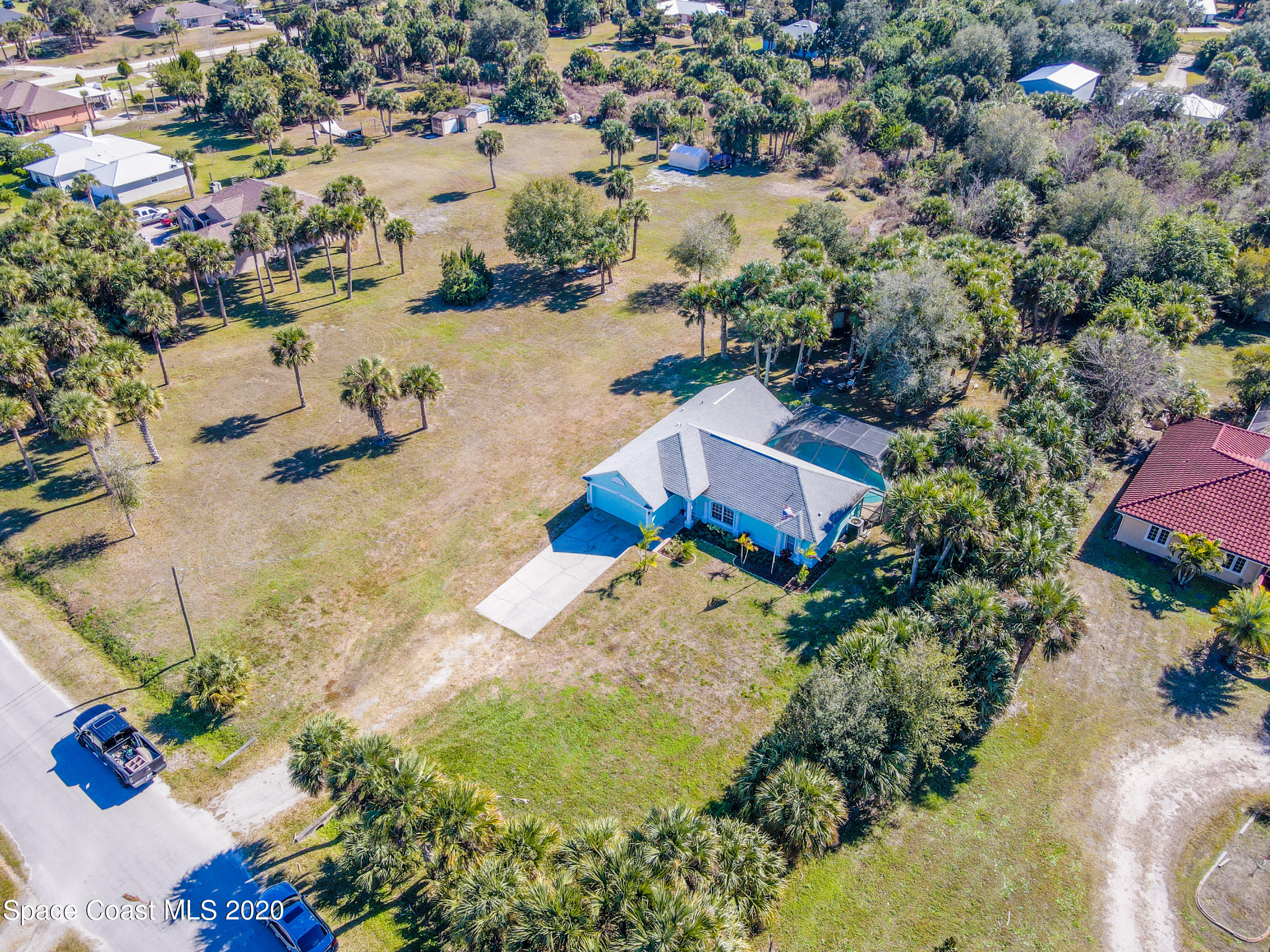 5345 Cangro Street Cocoa, FL 32926 - Photo 2 of 28 an aerial view of residential houses with outdoor space