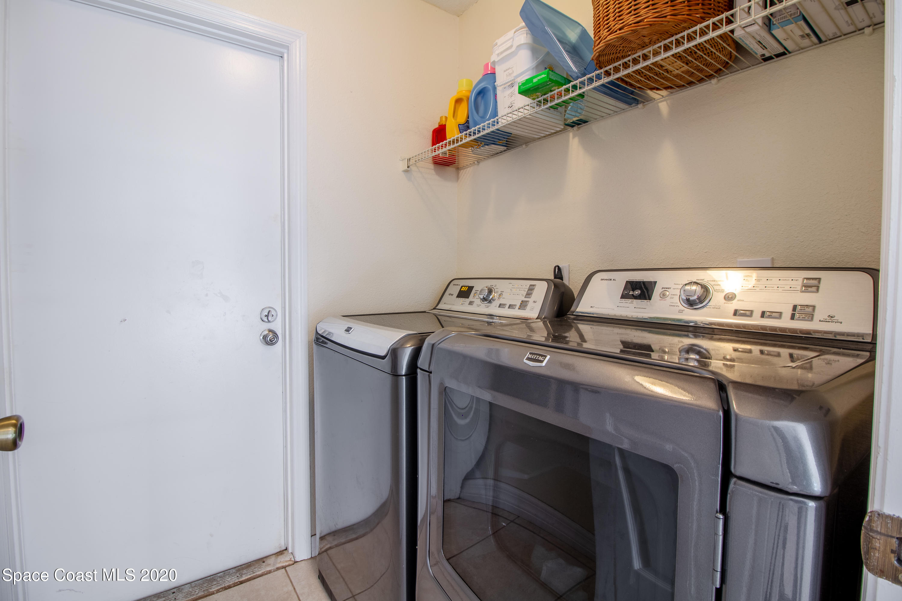 5345 Cangro Street Cocoa, FL 32926 - Photo 11 of 28 a utility room with dryer and washer