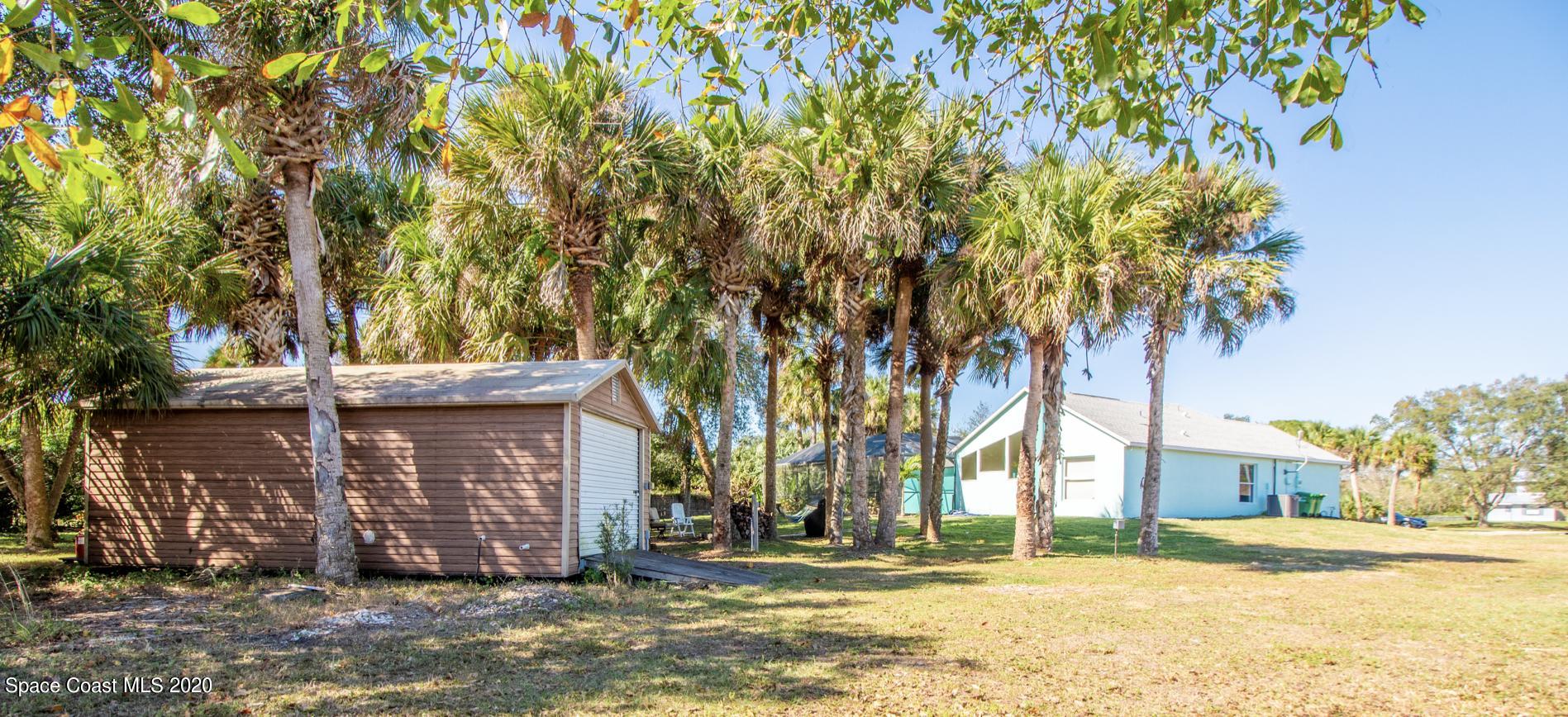 5345 Cangro Street Cocoa, FL 32926 - Photo 5 of 28 a view of a house with a yard