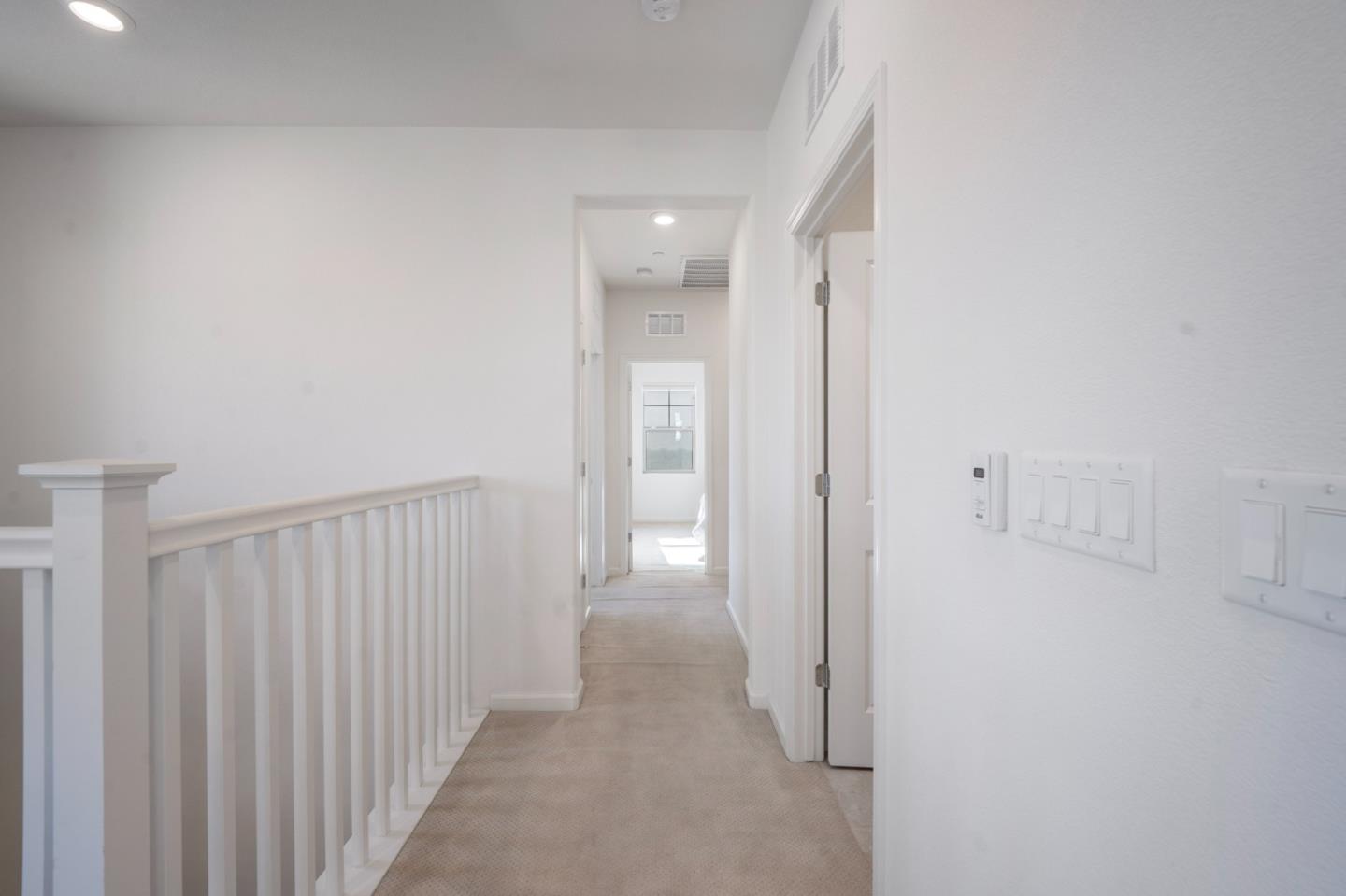 712 Baxter Way Gilroy, CA 95020 - Photo 14 of 37 a view of a hallway