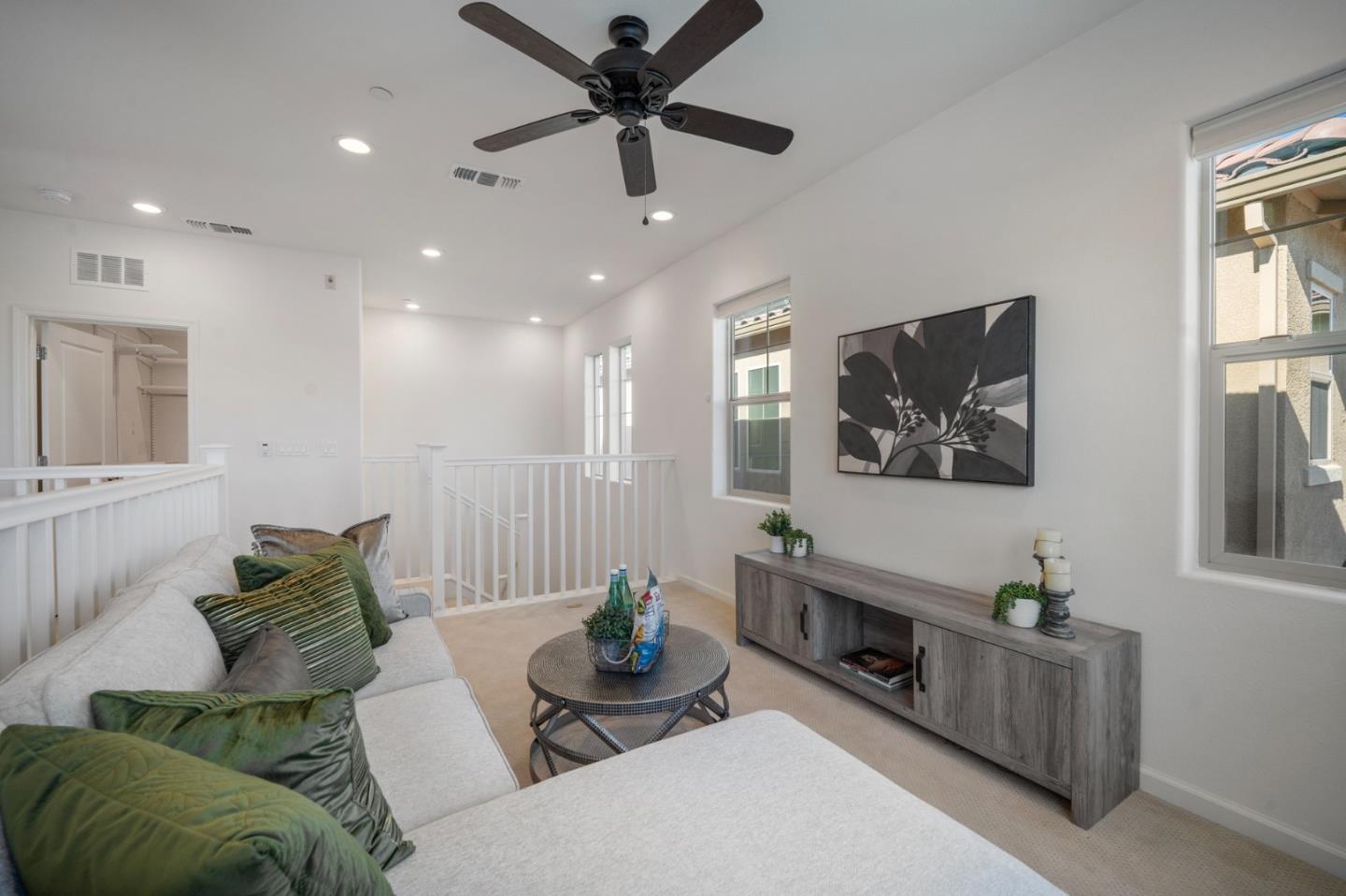 712 Baxter Way Gilroy, CA 95020 - Photo 16 of 37 a living room with furniture and a ceiling fan