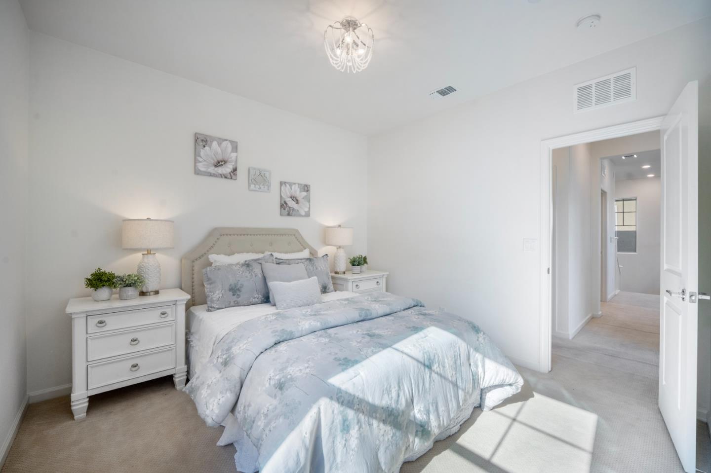 712 Baxter Way Gilroy, CA 95020 - Photo 17 of 37 a bedroom with a bed and a night stand