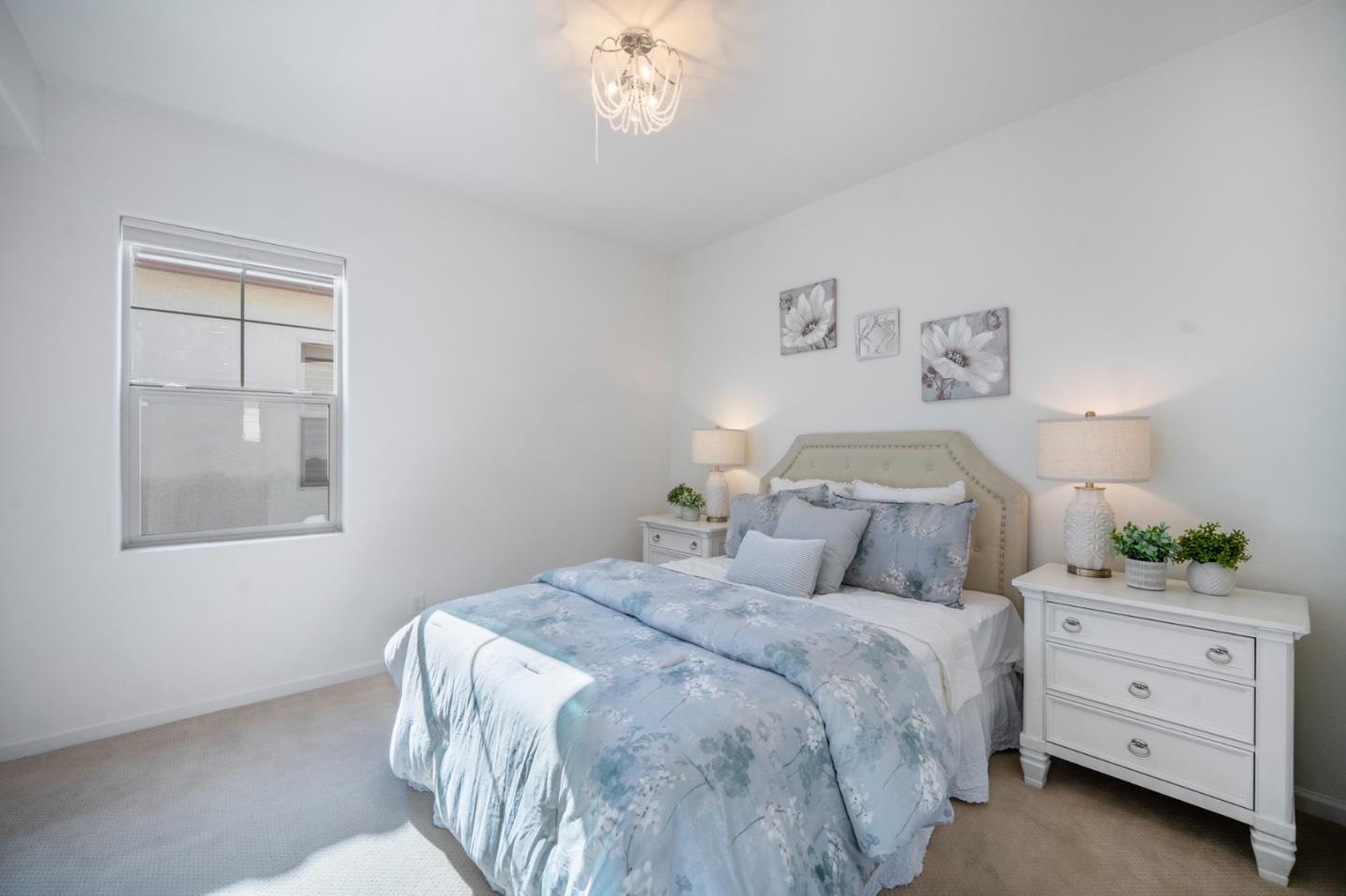 712 Baxter Way Gilroy, CA 95020 - Photo 20 of 37 a bedroom with a bed and a window