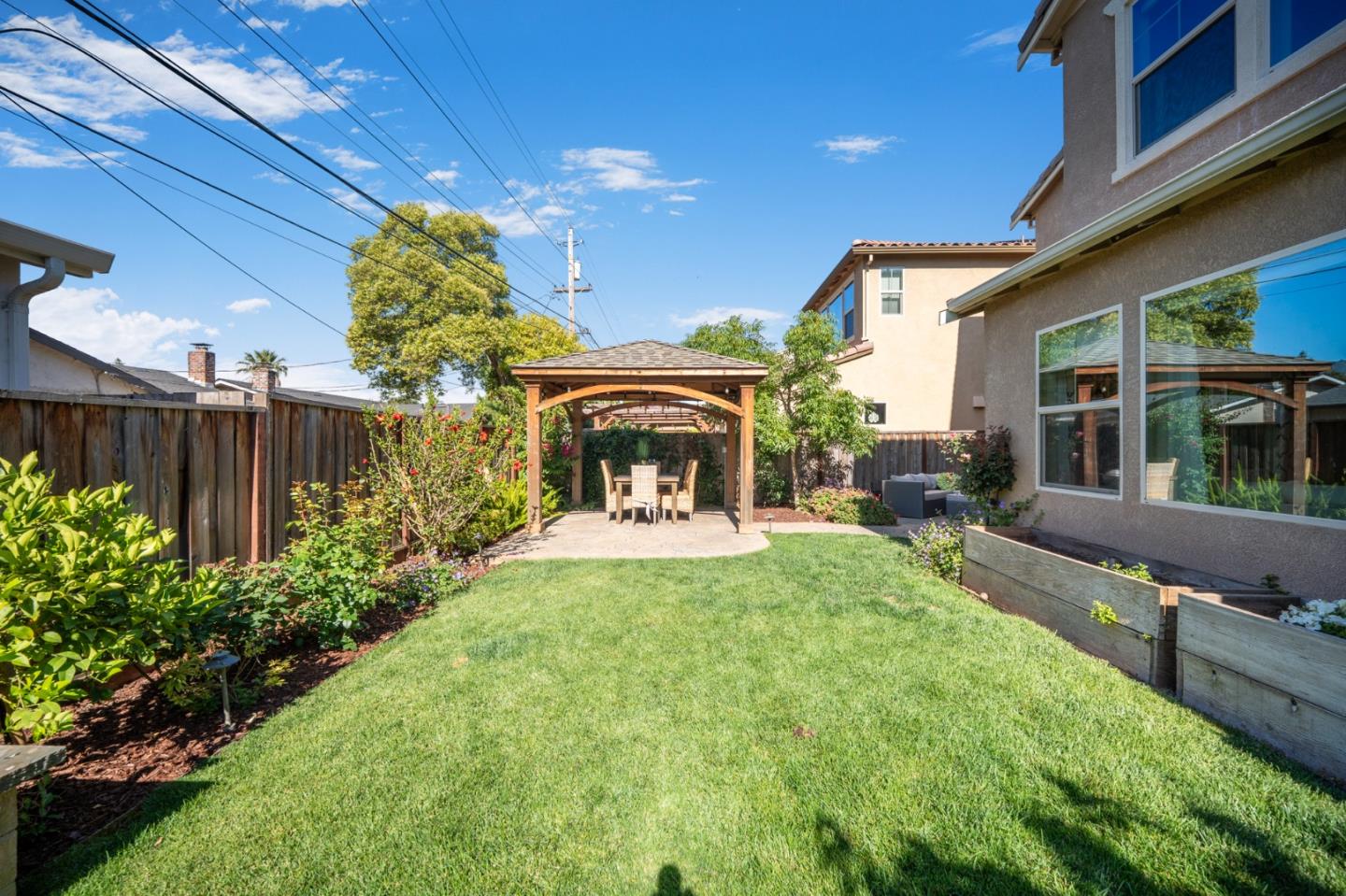 712 Baxter Way Gilroy, CA 95020 - Photo 29 of 37 a view of a porch with furniture and garden