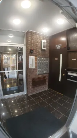 a lobby with a glass door