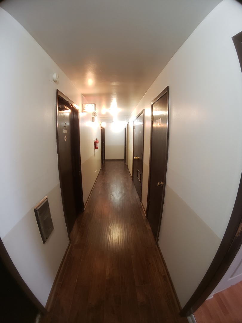336 Lathrop Avenue, Unit 502 Forest Park, IL 60130 - Photo 6 of 38 a view of gallery with wooden floor